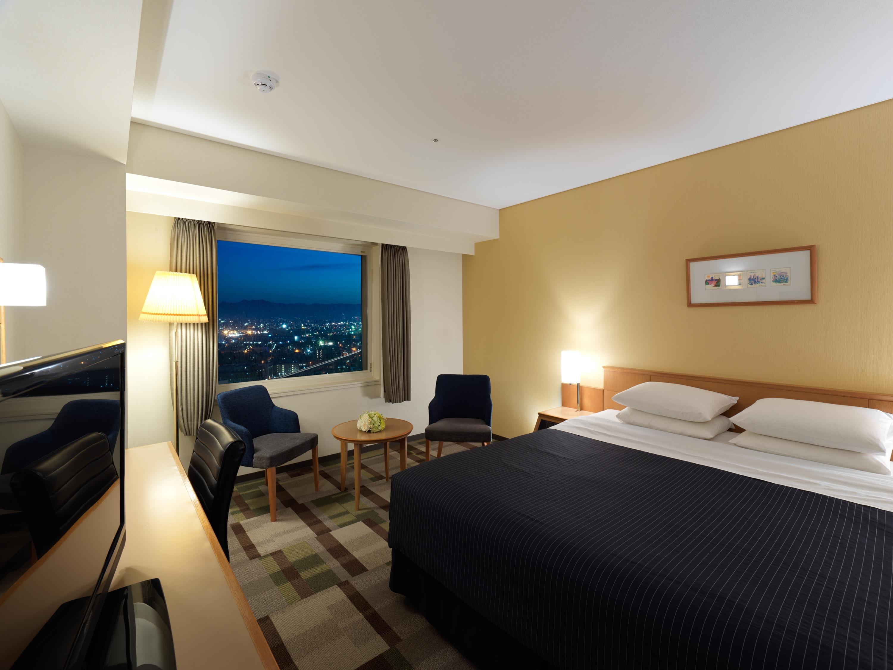 Hotel Emisia Sapporo Exteriör bild A room at the hotel
