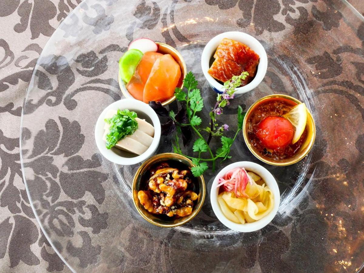 Hotel Emisia Sapporo Exteriör bild A selection of Indian chutneys