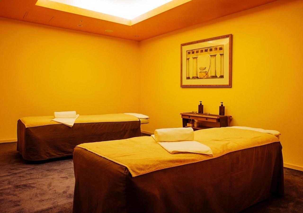 Hotel Emisia Sapporo Exteriör bild A massage room at a spa